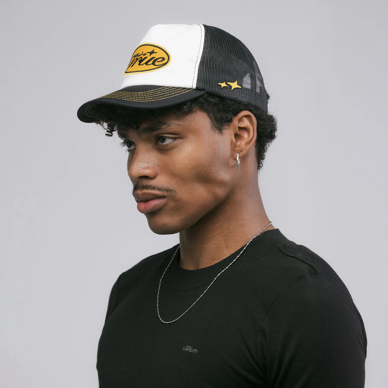 TRUE STAMP TRUCKER CAP BLACK - FRONT OF