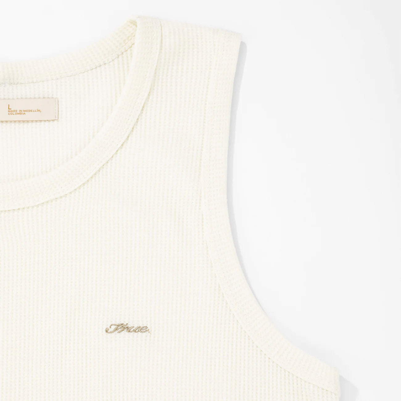 TRUE TEXTURE SLEEVELESS TEE CREAM - FRONT OF