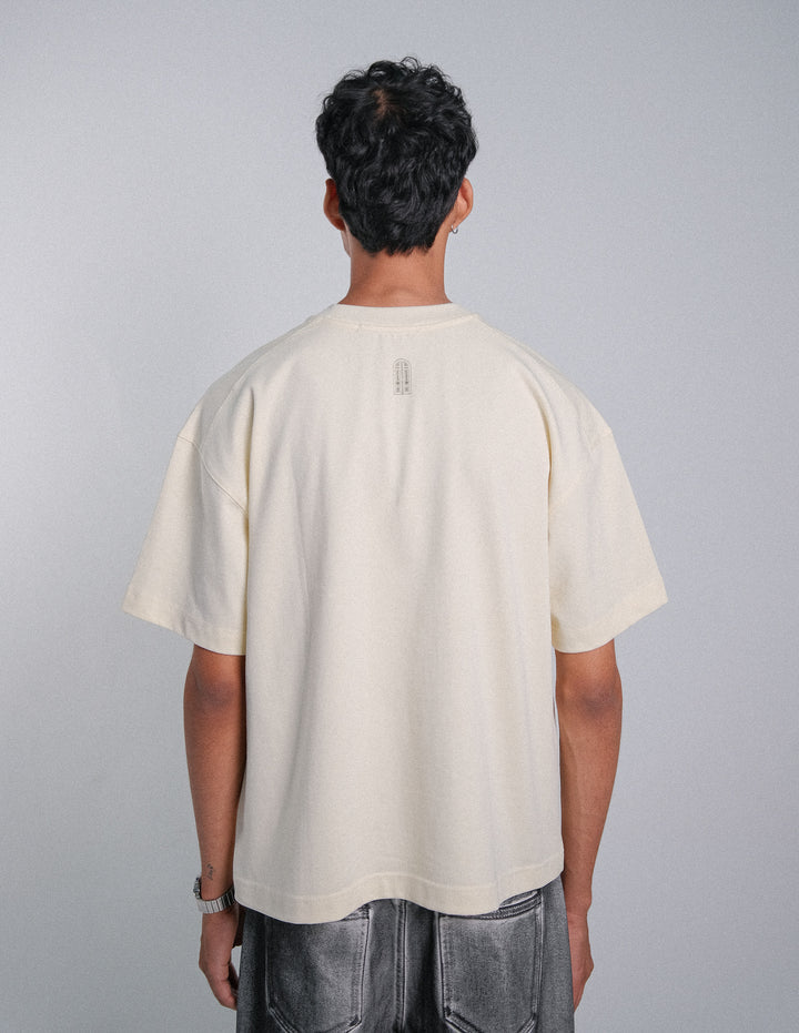 CAMISETA BOXY FIT FLORECIENDO CREMA - FRONT OF