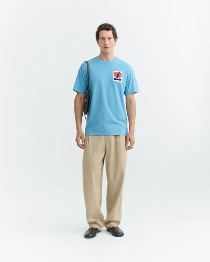 BLUE T-SHIRT PATCHED OPTIMIST ZACH - FRONT OF