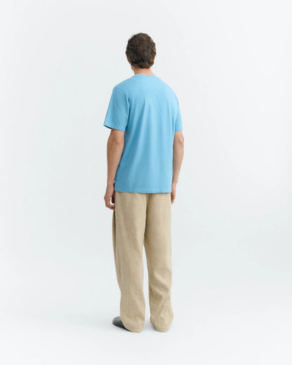 BLUE T-SHIRT PATCHED OPTIMIST ZACH - FRONT OF