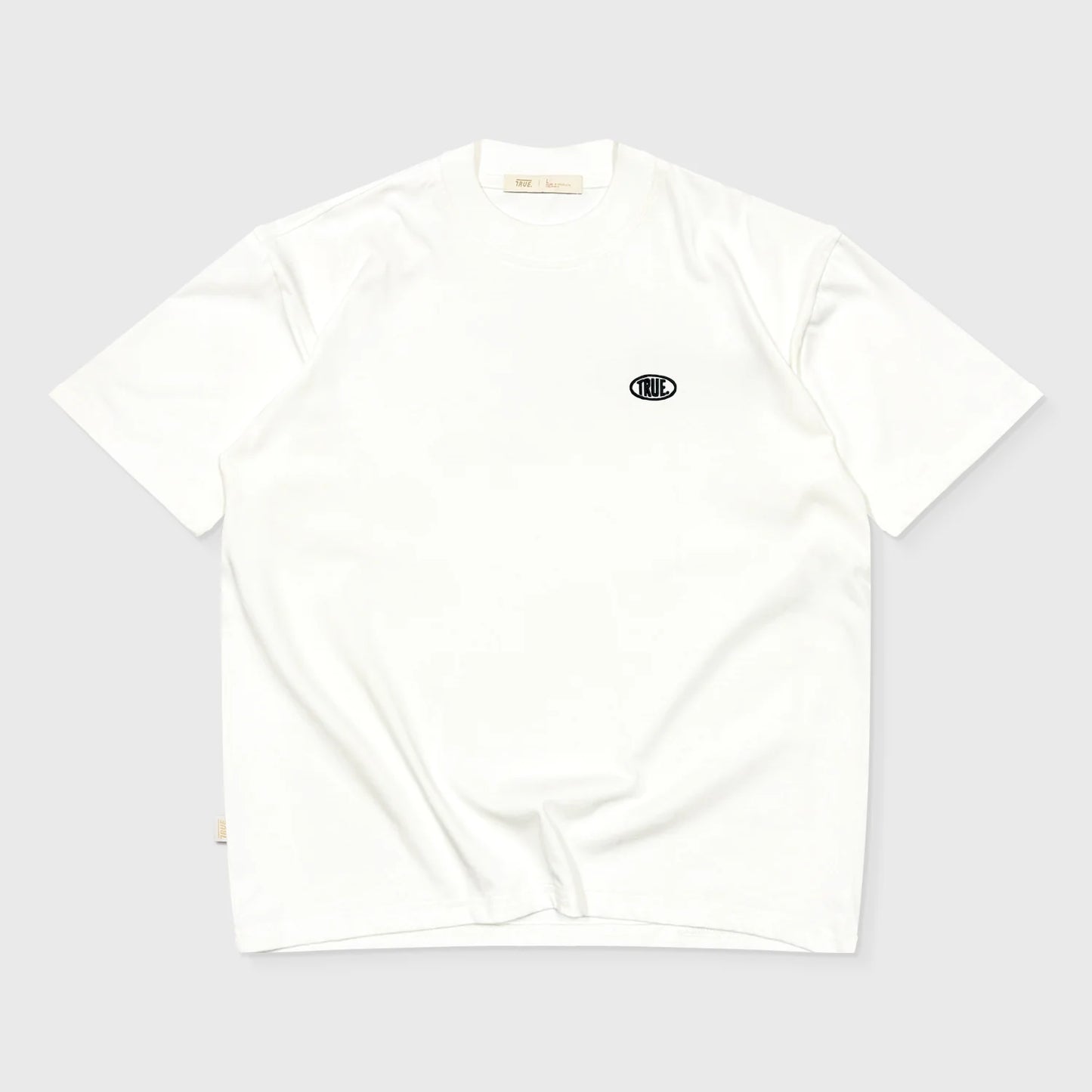 TRUE UNIFORM OVERSIZED T-SHIRT CREAM - FRONT OF