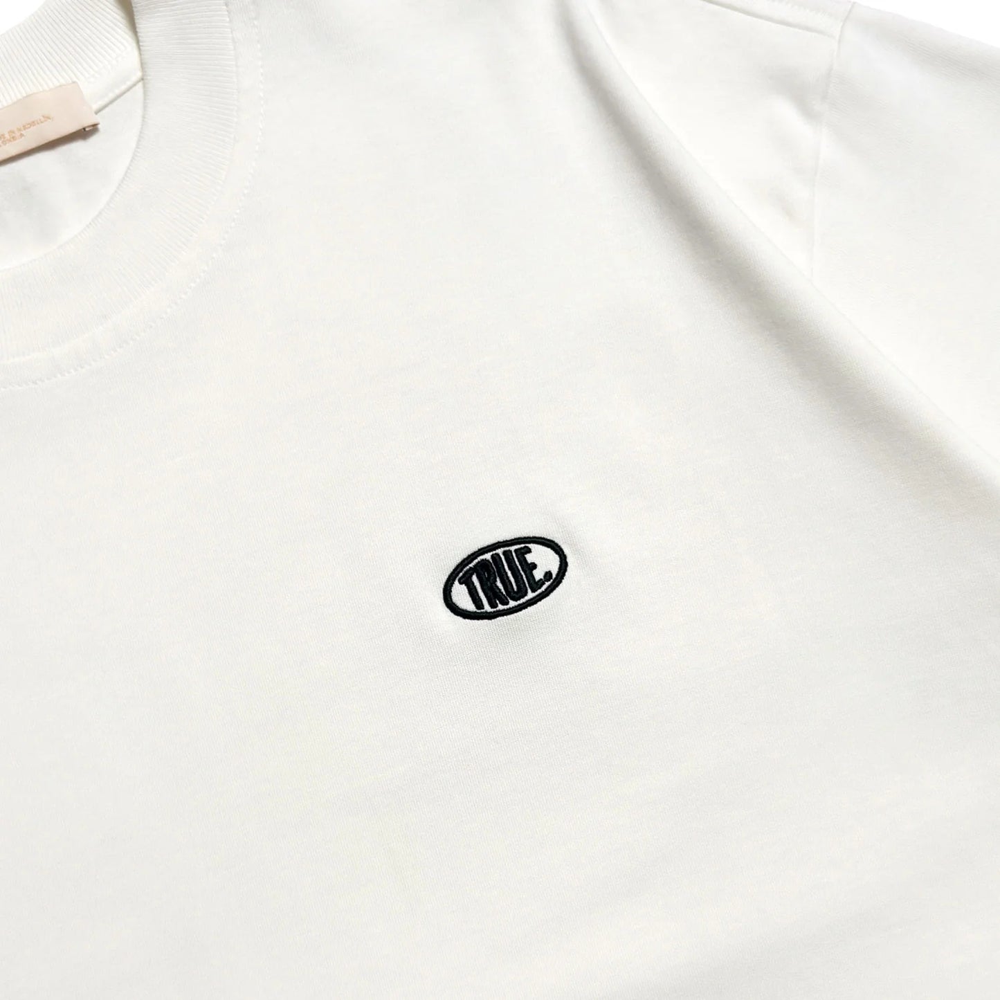 TRUE UNIFORM OVERSIZED T-SHIRT CREAM - FRONT OF