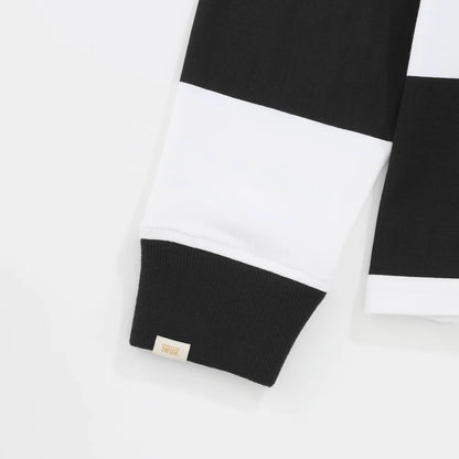 TRUE LOUNGE LONGSLEEVE BOXY POLO BLACK - FRONT OF.